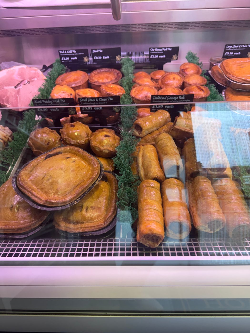 The butcher's counter — pork pies and sausage rolls I walked past for the first time ever
